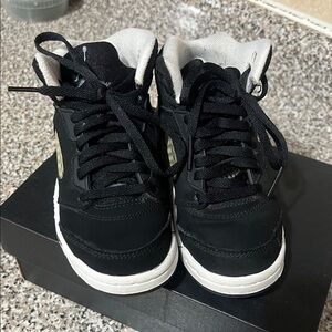 Jordan Kids Black and White High-Top Sneakers